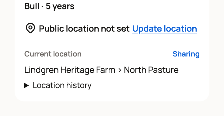 The public location line above the private Current location, with the Sharing link